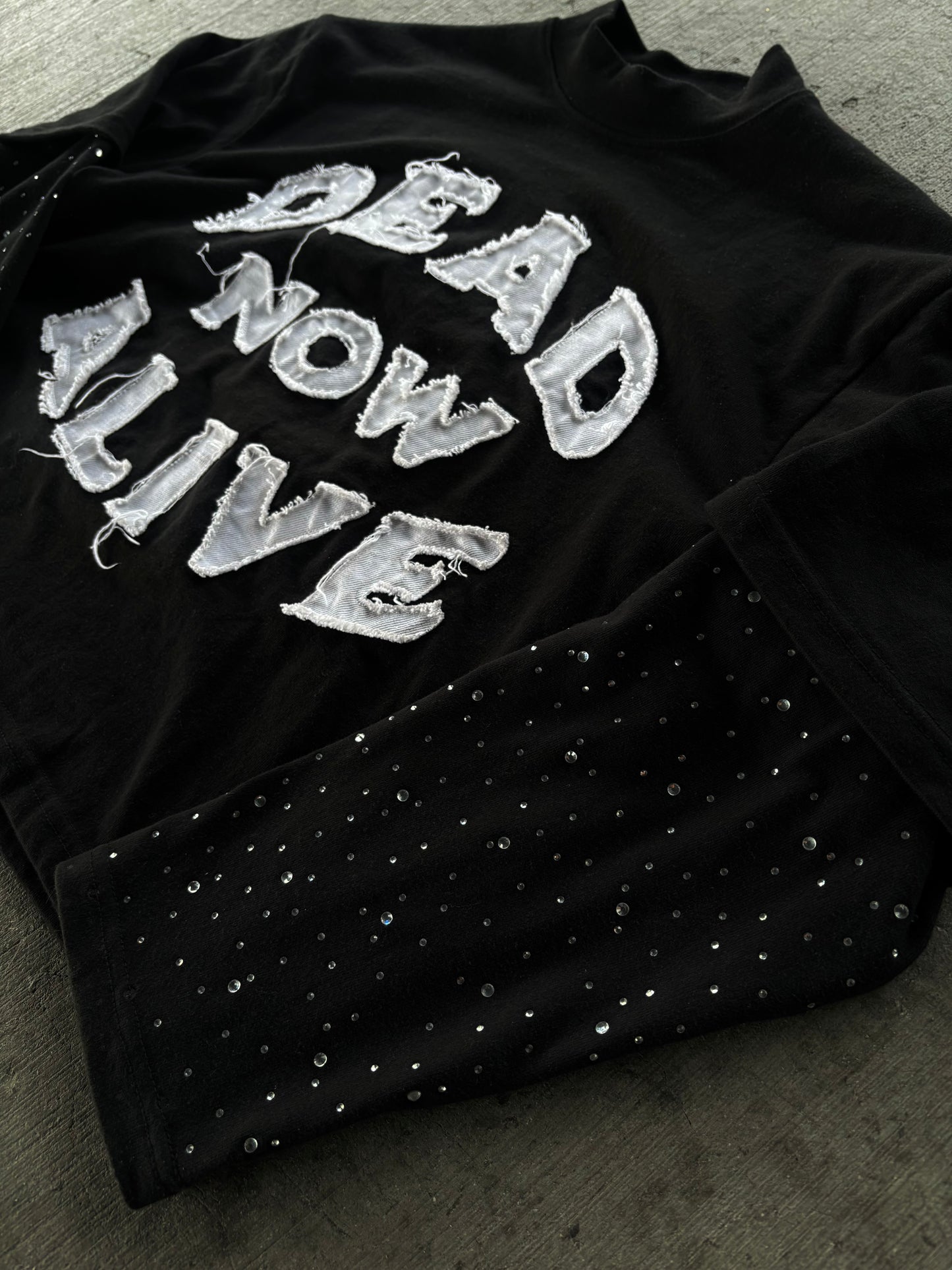 “In Jesus we trust” long sleeve